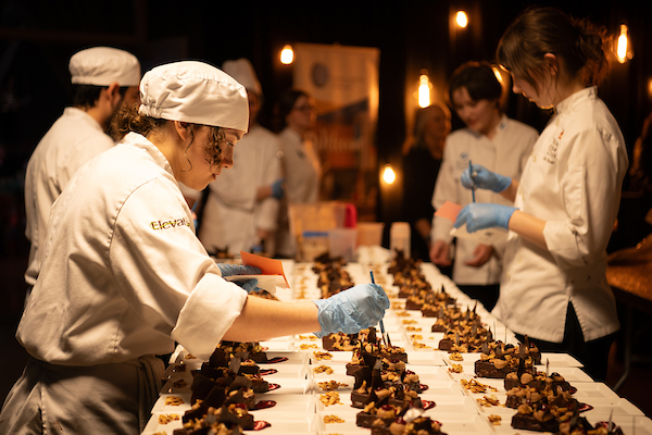 Elevation students preparing food at COCC's Meal of the Year.